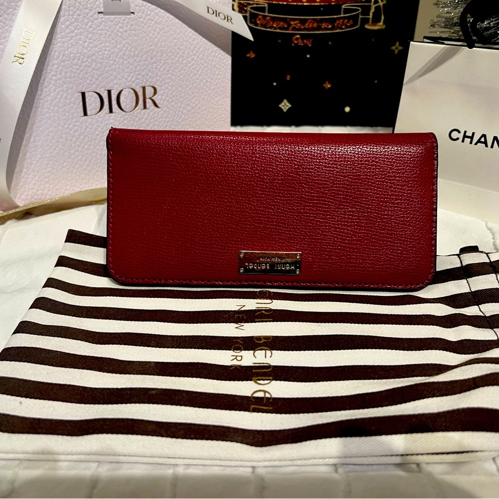 Henri Bendel gorgeous red with gold hardware ware long wallet and dust bag. EUC